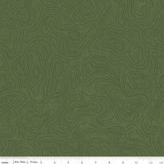 Green tone-on-tone print featuring lines of a topographical map with ruler