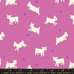 Pattern of baby goats on a purple background with ruler