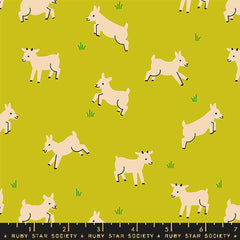 Pattern of baby goats on a green background with ruler