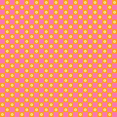 Checkered pattern with pink and orange squares with small flowers