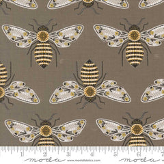 Pattern of large bees on a gray background with ruler