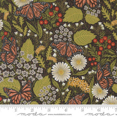 Pattern of butterflies and flowers on a dark background with ruler