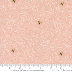 Pattern of bees on a black background with ruler