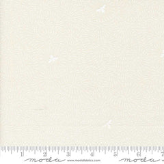 Textured white fabric pattern with ruler