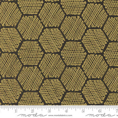 Hexagonal pattern with a textured surface in gold color with ruler