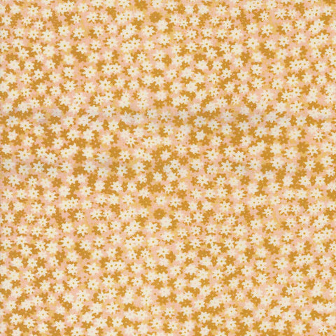 Pattern of small white flowers on a yellow background
