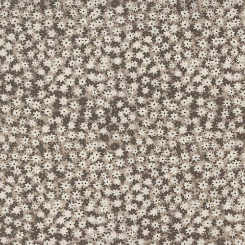 Pattern of small white flowers on a silver background