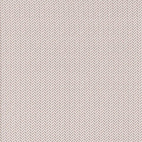 White fabric texture with a herringbone pattern