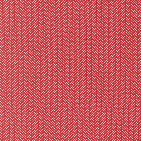 Red fabric texture with a herringbone pattern