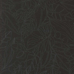 Patterned fabric with leaves and berries on a black back ground