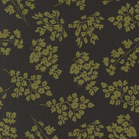 Green floral pattern on a black background