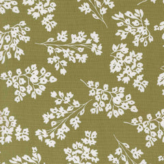 White floral pattern on a green background