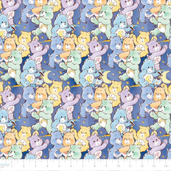 Pattern of colorful Care Bears on a blue background with ruler