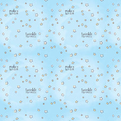 Pattern of stars and text 'twinkle, twinkle' and 'make a wish' on a light blue background
