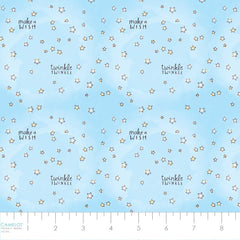Pattern of stars and text 'twinkle, twinkle' and 'make a wish' on a light blue background with ruler