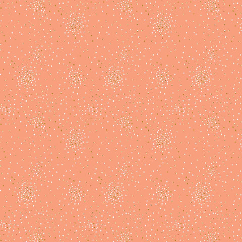 Pattern of small white and yellow metallic clusters of dots on a pink background