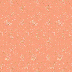 Pattern of small white and yellow metallic clusters of dots on a pink background