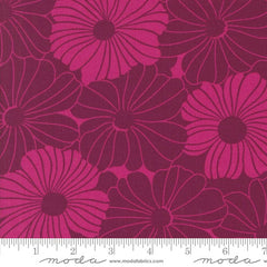 Pattern of pink flowers on a pink background with ruler