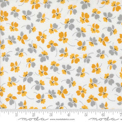 Floral pattern with yellow and gray flowers on a white background with ruler