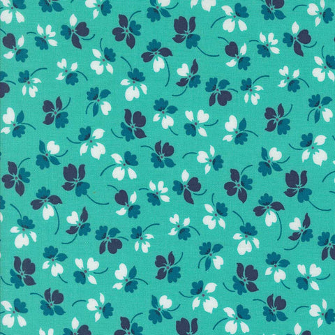 Floral pattern with small flowers on an aqua background
