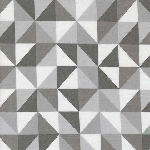 Geometric pattern of triangles in shades of gray and white