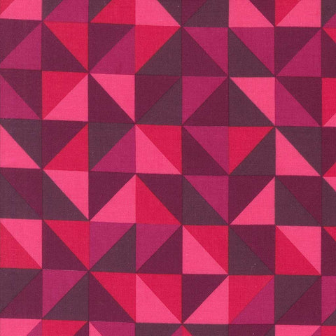 Geometric pattern of triangles in shades of pink and purple