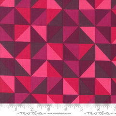 Geometric pattern of triangles in shades of pink and purple with ruler