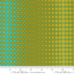 Pattern of blue and green circles on a green background with ruler