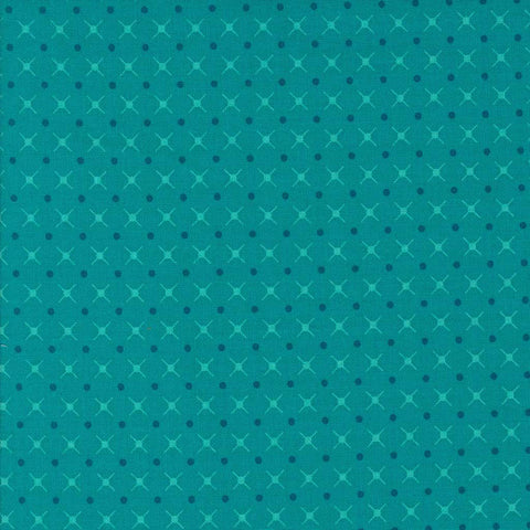 Patterned fabric with a geometric design on a blue background