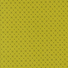Patterned fabric with a geometric design on a green background