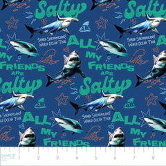 Pattern of sharks and text on a navy background with ruler