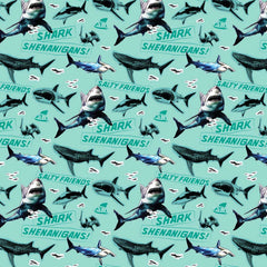 Pattern of sharks and text on a light turquoise background