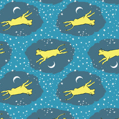 Pattern of yellow cows leaping over the moon across a starry night sky with a blue background