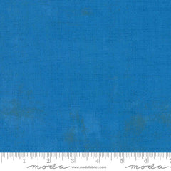 Blue grunge blender with ruler