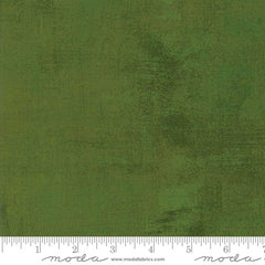 Green grunge blender with ruler
