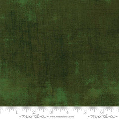 Green grunge blender with ruler