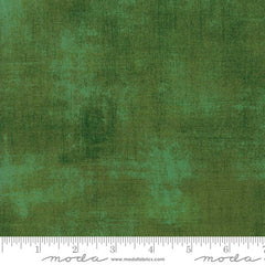 Green grunge blender with ruler