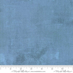 Blue grunge blender with ruler