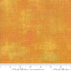 Orange grunge blender with ruler