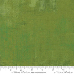 Green grunge blender with ruler