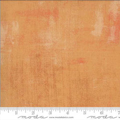 Orange grunge blender with ruler