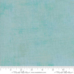 Blue grunge blender with ruler