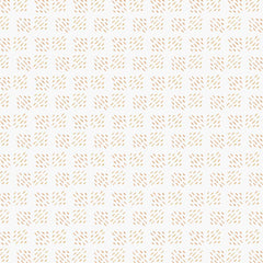 Light geometric print on an off-white background