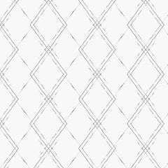 Light lattice print on an off-white background