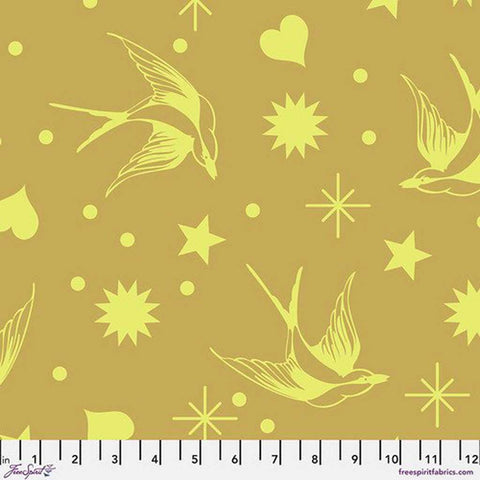Pattern of yellow birds, hearts, stars, and dots on a dark yellow background with ruler