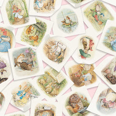 Tossed pages of scenes with characters from Peter Rabbit on a pink background