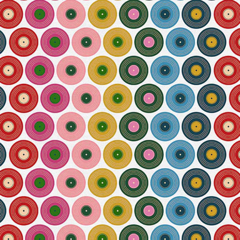 Pattern of colorful vinyl records on a white background