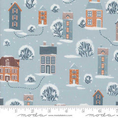 Pattern of small houses and trees on a light blue background with ruler