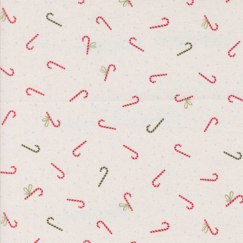 Pattern of red and green candy canes on a white background