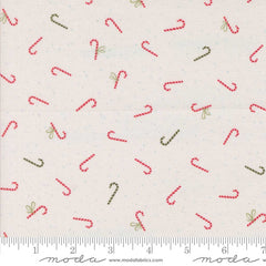 Pattern of red and green candy canes on a white background with ruler